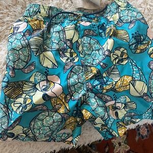Tea Collection Boys' Teal Floral Swim Trunks